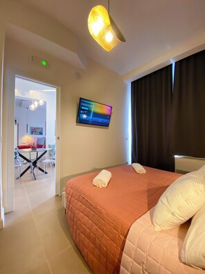 1 slaapkamer, een bureau, een strijkplank/strijkijzer, wifi