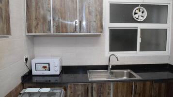 Microwave, oven, stovetop, cookware/dishes/utensils