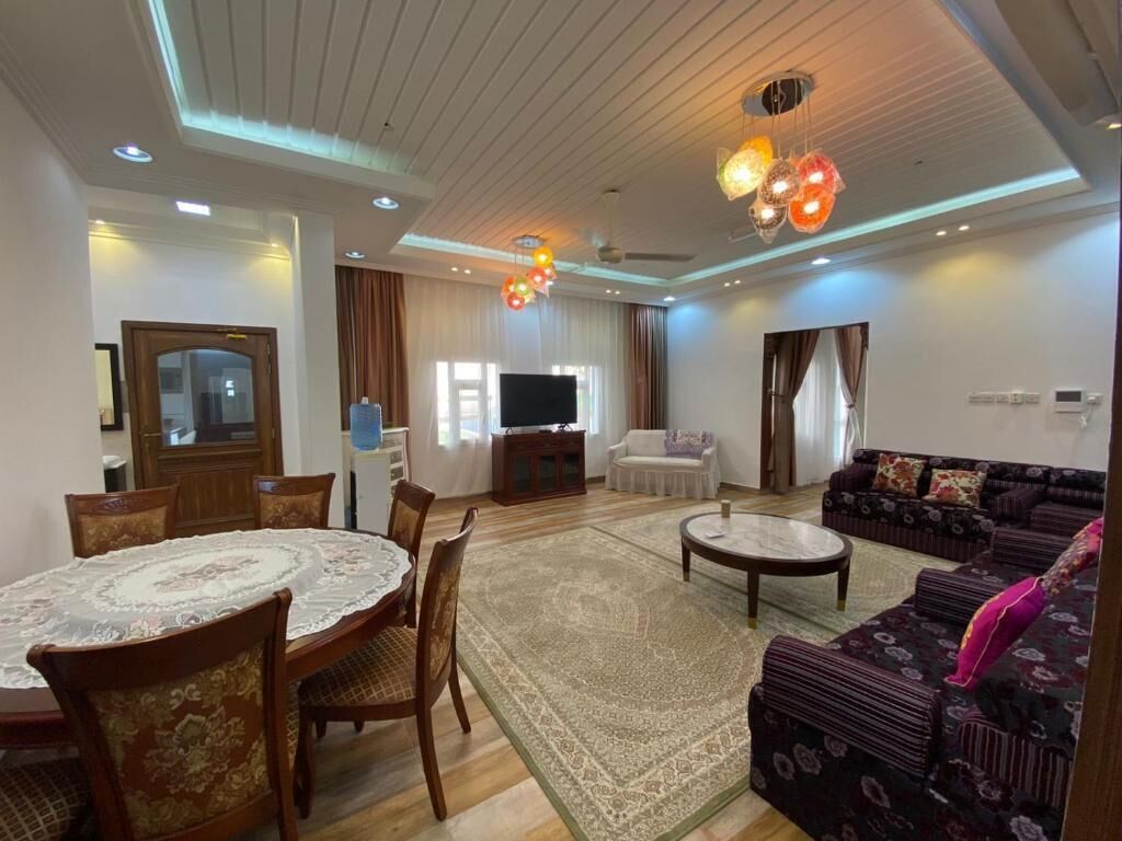 Family Chalet, 4 Bedrooms, Patio, Poolside | Living area | 32-inch Smart TV with satellite channels