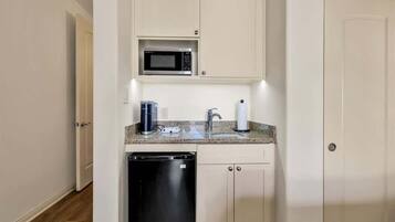 Microwave, coffee/tea maker, cookware/dishes/utensils