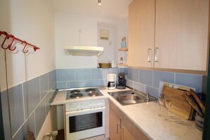 Geladeira, fogão, cooktop, cafeteira/chaleira