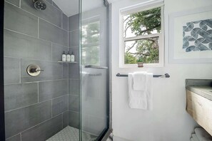 Shower, hair dryer, towels