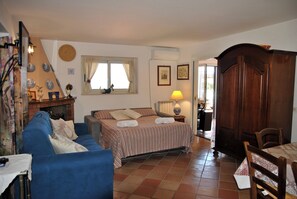 Apartment, 1 Schlafzimmer, Raucher, eigener Pool | Wohnzimmer