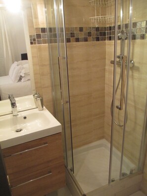Eco-friendly toiletries, hair dryer, towels, soap
