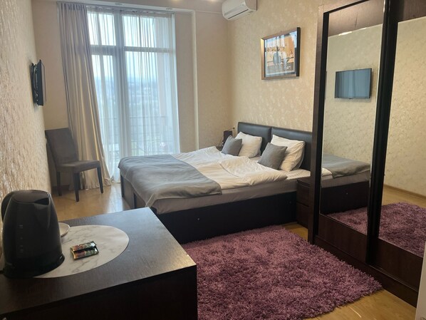 4 slaapkamers, een strijkplank/strijkijzer, wifi, beddengoed