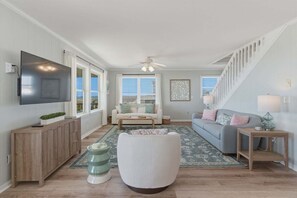 Smart TV, DVD player, books - Experience oceanfront bliss at Bikini Bottom, a spacious 5-bedroom retreat in Oak Island. (Oak Island)