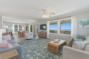 Smart TV, DVD player, books - Experience oceanfront bliss at Bikini Bottom, a spacious 5-bedroom retreat in Oak Island. (Oak Island)