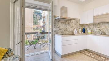 Appartamento familiare, 2 camere da letto (GP - Casa Adriana - Sea And Relax) | Cucina privata | Frigorifero, microonde, forno, piano cottura