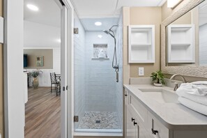 Shower, hair dryer, towels
