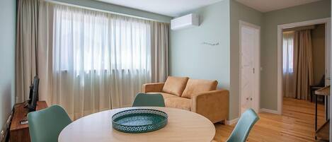 Comfort Apartment, City View | Living area | Flat-screen TV