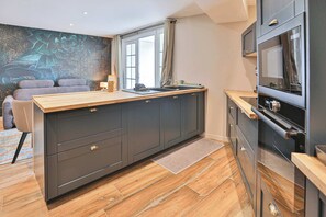 Fridge, microwave, coffee/tea maker, toaster