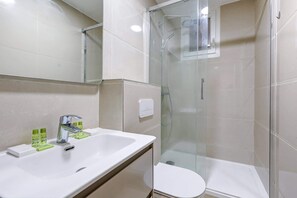 Shower, hair dryer, shampoo