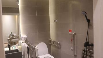 King Room with Roll-In Shower - Disability Access | Bathroom | Bathtub, free toiletries, hair dryer, bathrobes