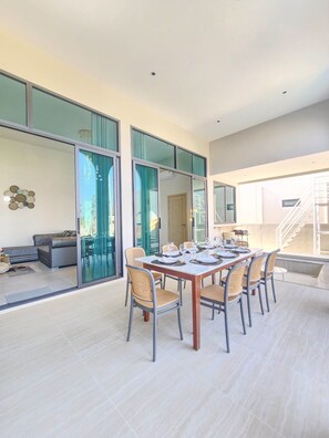 Deluxe Villa, Pool View | Living area | 32-inch flat-screen TV with cable channels - Phattra Pool villa Cha-am (Cha-am)