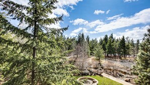 A natural landscape with a pathway, trees, and a clear sky. - Stay & Play: Suncadia Resort Condo in Cle Elum (Cle Elum)