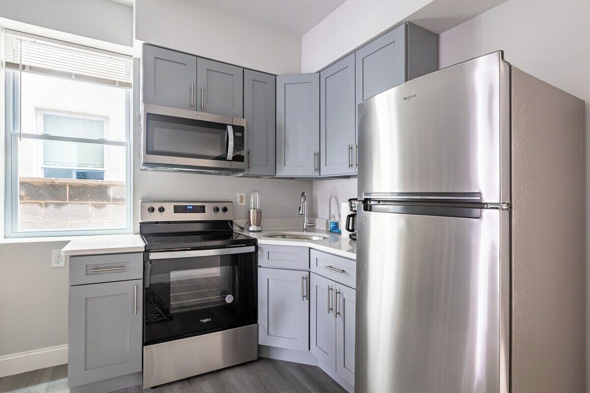 Departamento, 2 habitaciones | Cocina privada | Refrigerador, microondas, horno y parrilla de estufa 