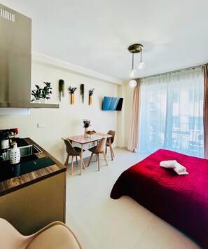 Apartamento Deluxe, balcón, vistas a la ciudad | Zona de estar