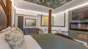 A hotel room with a bed, a desk, a chair, a bathtub, and a TV.