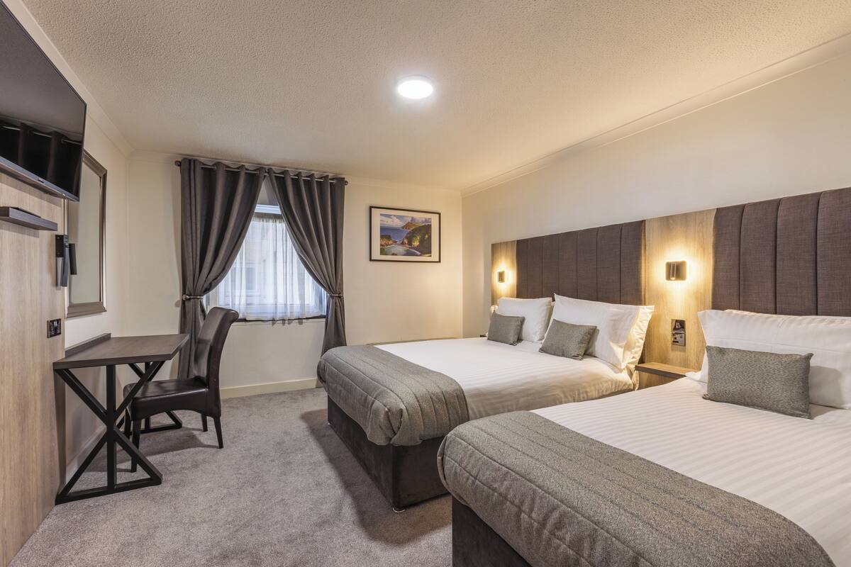 Blackout drapes, iron/ironing board, WiFi (free), bed sheets