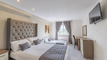 Blackout curtains, iron/ironing board, free WiFi, bed sheets