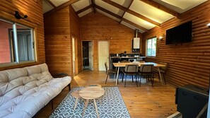 Family Cabin, 2 Bedrooms, Balcony, Mountain View | Living area | Flat-screen TV, fireplace - Pangui Lodge (Pinto)