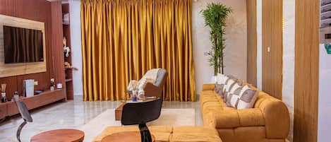 Family Apartment, Balcony | Living area | 36-inch Smart TV with digital channels, Netflix, streaming services