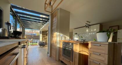 Design villa with glass roof and parquet flooring, garden and fitness center near downtown