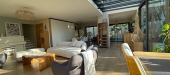 Design villa with glass roof and parquet flooring, garden and fitness center near downtown