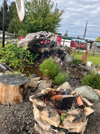 Property grounds. RV in charming Forks with WiFi, AC. Happy travel and 1 block from Bella’s house!