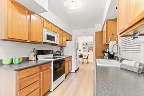 Fridge, microwave, oven, stovetop - Oldtown Retreat - Spacious Designer Home with Pool (Scottsdale)