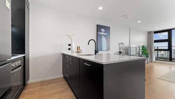 Coffee/tea maker, fridge, microwave, oven