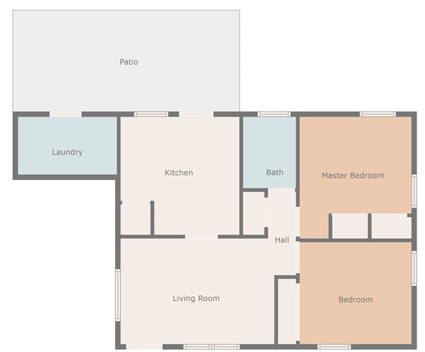 Plano de planta que muestra un patio, lavandería, cocina, baño, dormitorio principal, sala de estar y dormitorio.