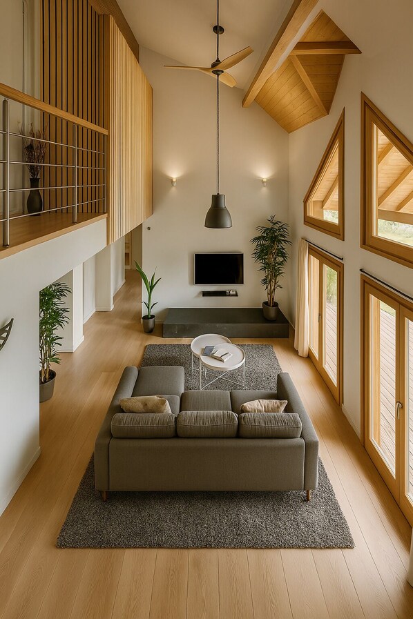 Appartement Supérieur, vue jardin | Coin séjour