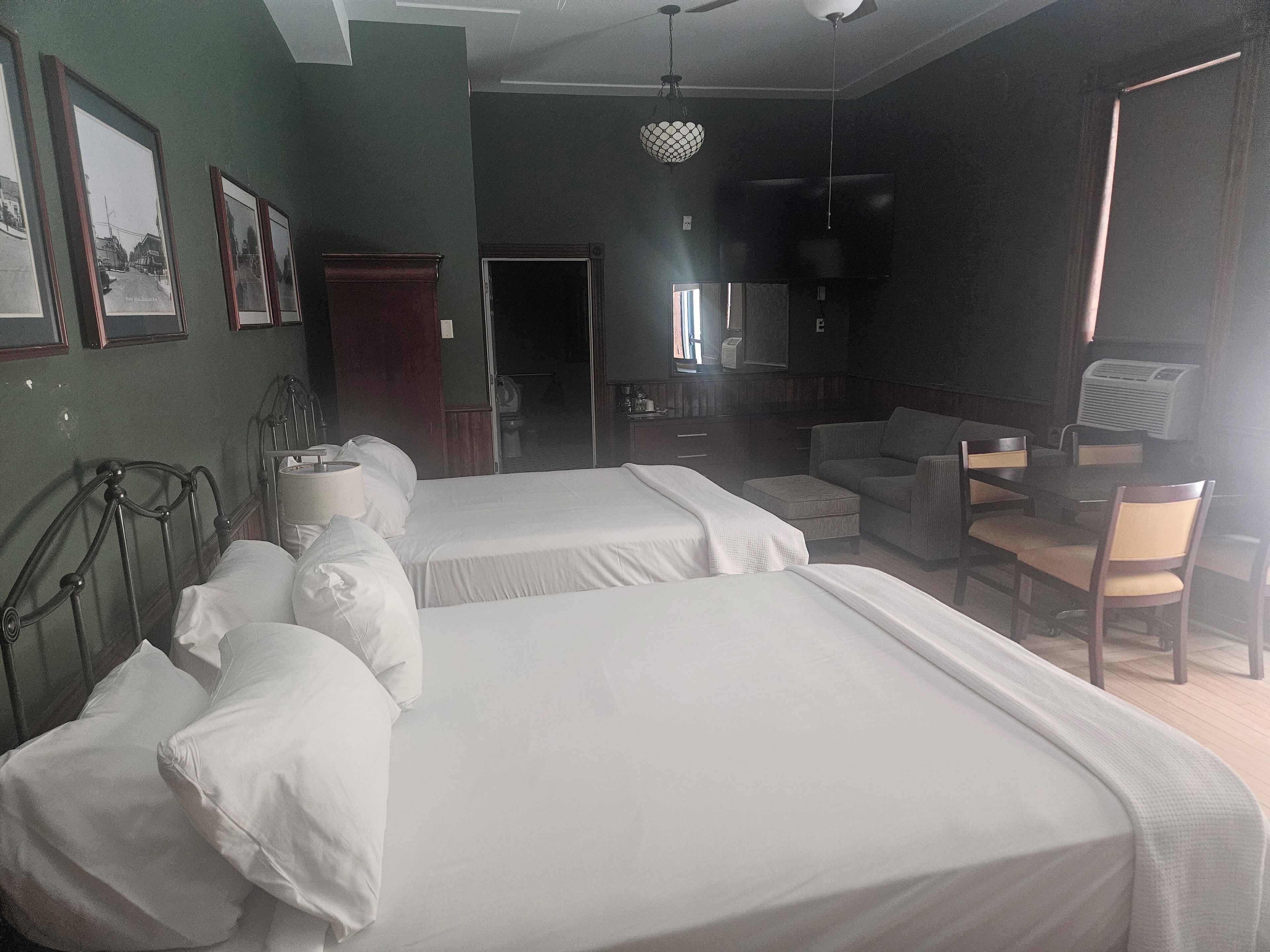 Family Room, ADA  compliance for Service dogs, non smoking, main level | Blackout drapes, iron/ironing board, free WiFi