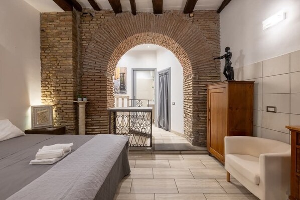 Step through the stone archway to a balcony with a view.