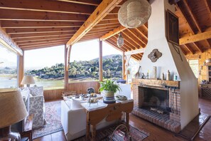 House, Patio, Lake View | Living room | 50-inch flat-screen TV with digital channels - Cozy Cabin in Avandaro (Valle de Bravo)