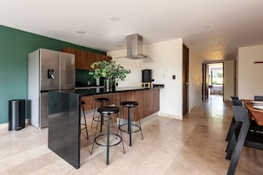 Fridge, microwave, stovetop, coffee/tea maker
