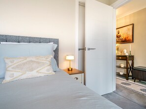 2 dormitorios, tabla de planchar con plancha, wifi gratis y ropa de cama