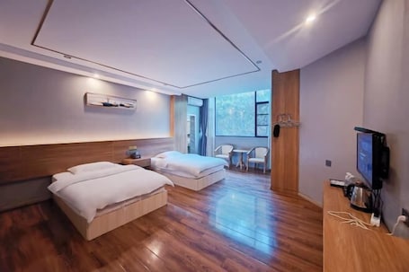 Room. Mojiang XinXing Business Hotel