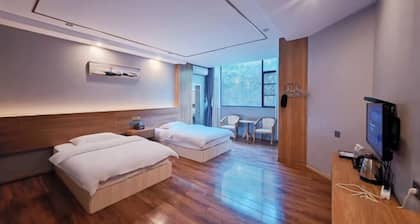 Mojiang XinXing Business Hotel