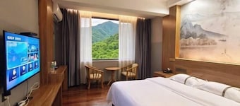 Mojiang XinXing Business Hotel