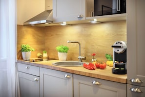 2 Rooms XXL with Balcony & A/C | Private kitchen | Full-size fridge, microwave, stovetop, dishwasher