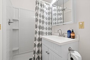 Hair dryer, towels, soap, shampoo