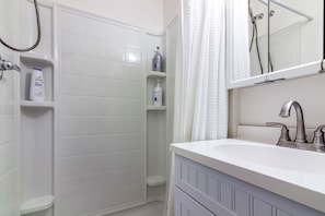 Hair dryer, towels, soap, shampoo