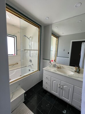 Jetted bath, towels, soap, toilet paper