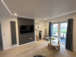 House, 2 Bedrooms | Living room | Books