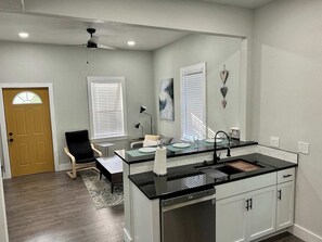 Interior - Spacious 4BR home with dedicated office, just 5 minutes to downtown KC and 10 minutes to St. Luke's Hospital/UMKC. Skyline views, full kitchen, laundry, and 3 off-street parking spaces. Ideal for 30+ day stays, traveling professionals, or families. (Kansas City)