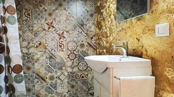 Junior Apartment | Bathroom | Hair dryer, towels, soap, shampoo