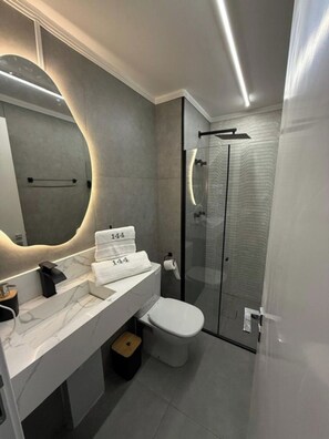 Hair dryer, towels, soap, shampoo