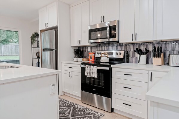 Fridge, microwave, oven, stovetop